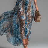 Stéphanie - Long chiffon dress with leopard print and bare shoulders