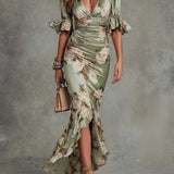 Kate - Asymmetrical long dress in green satin with V-neck, flared puff sleeves, and floral pattern