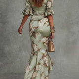 Kate - Asymmetrical long dress in green satin with V-neck, flared puff sleeves, and floral pattern