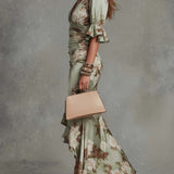 Kate - Asymmetrical long dress in green satin with V-neck, flared puff sleeves, and floral pattern